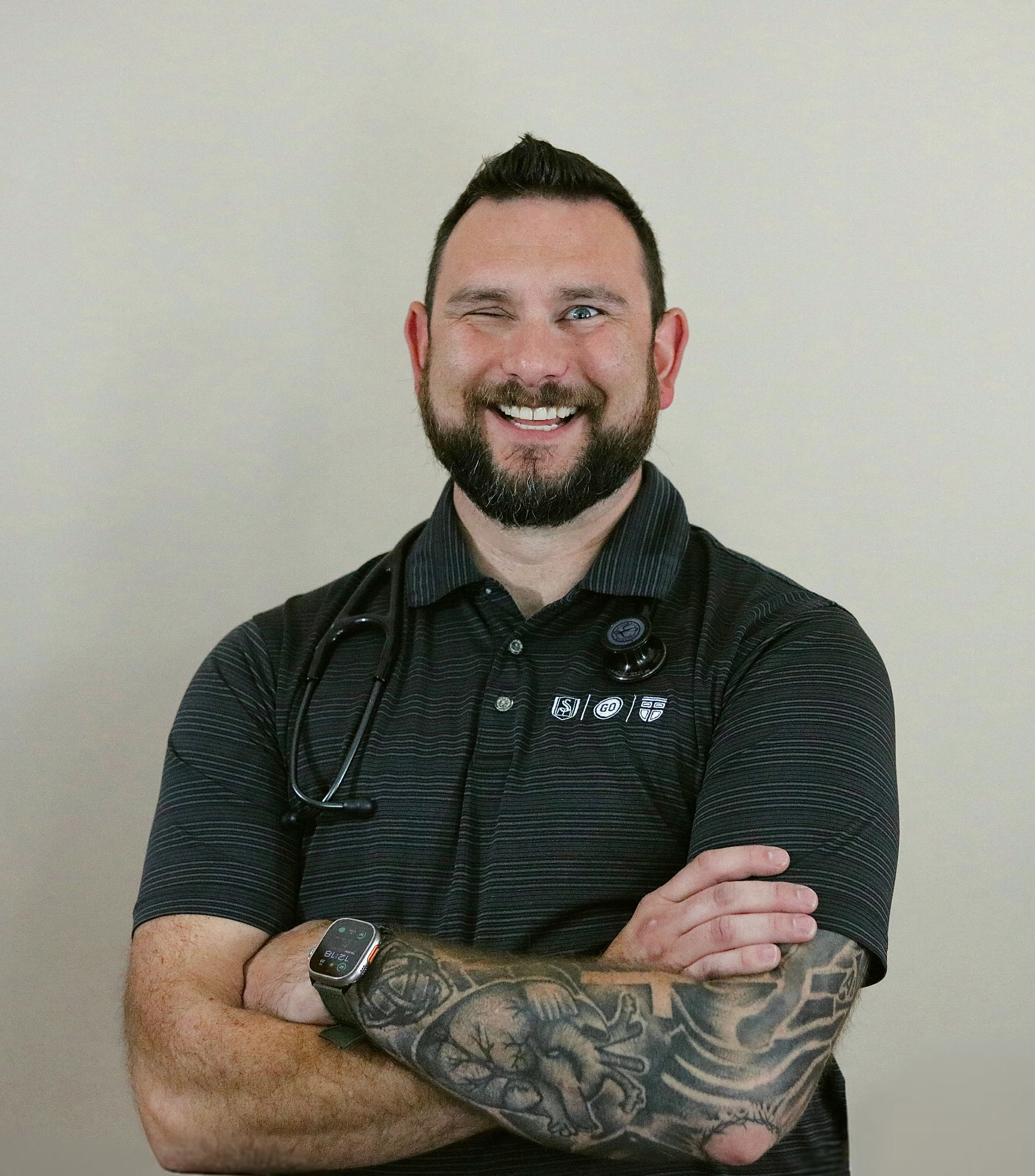 Chris Woods smiling and winking, approachable telemedicine provider